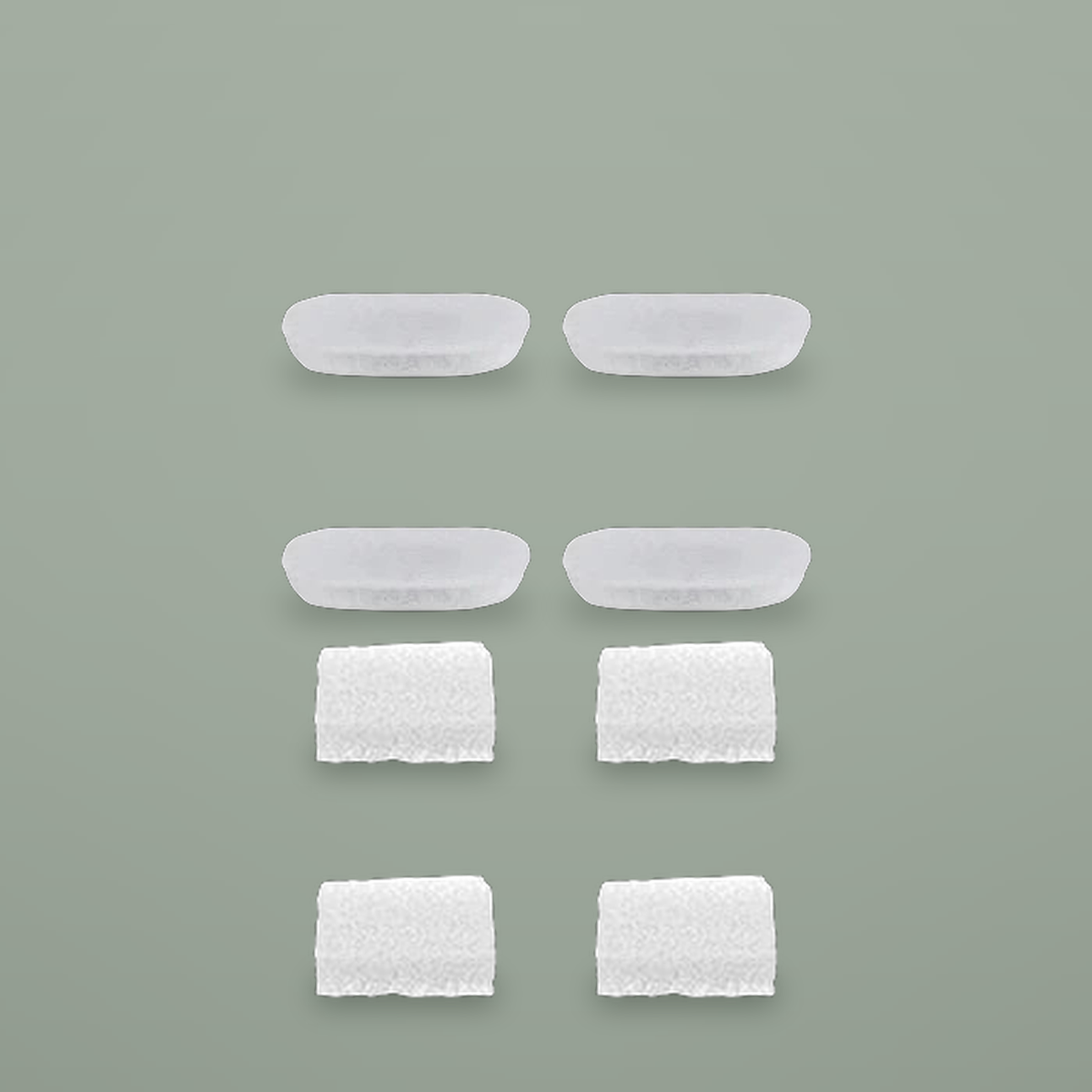 Four carbon filter pads and four foam pre-filters on a plain background.