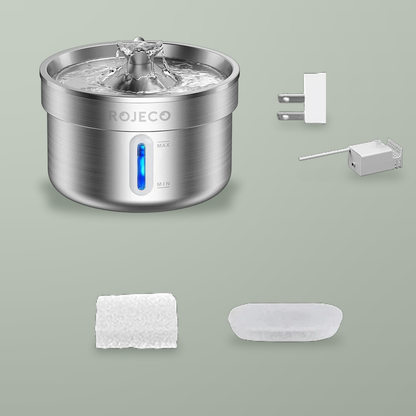 Steel pet fountain with a white US adapter, pump, one sponge filter and one carbon filter.
